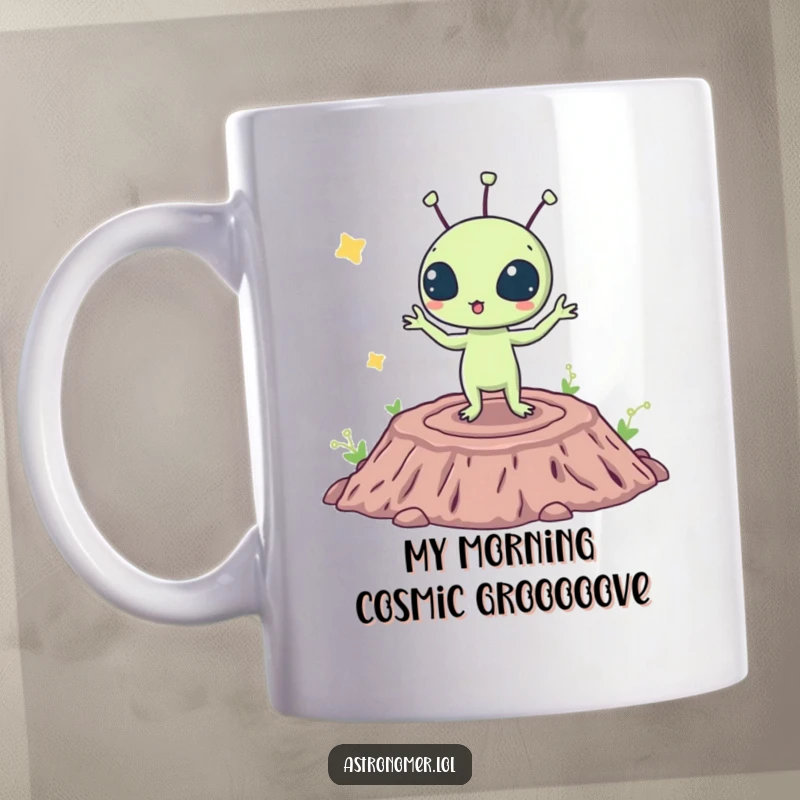 Funny mug featuring a surprised alien with big eyes doing a wacky dance on a moon crater, leaving funny footprints.