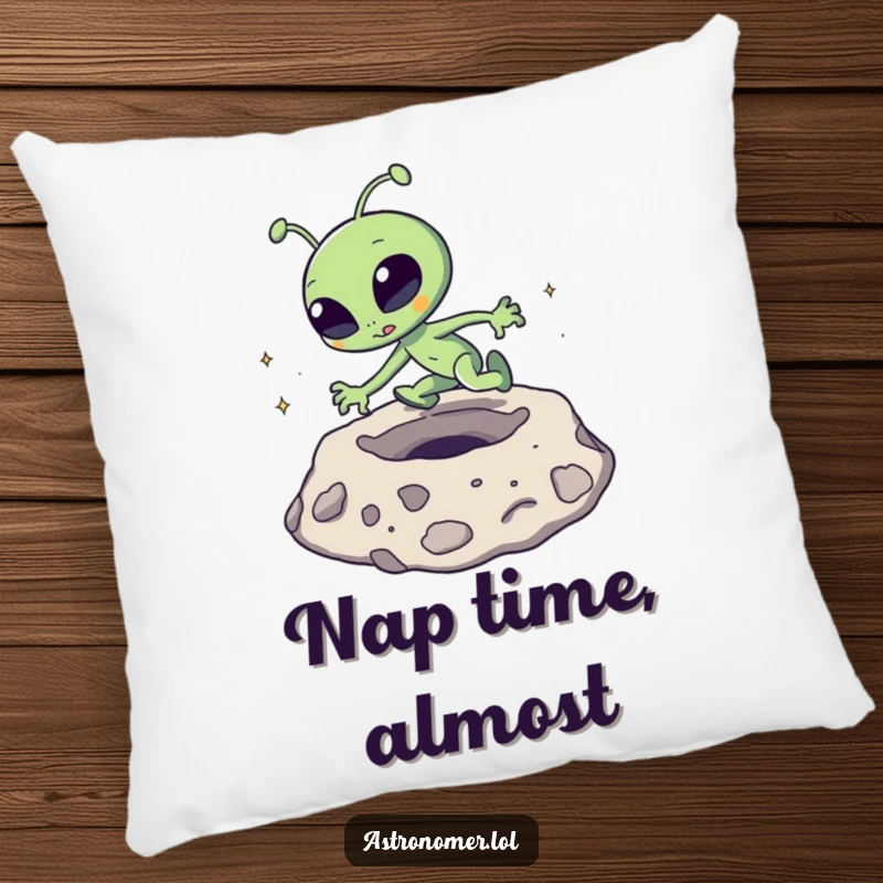 Funny Pillow: A goofy alien character comically tripping over a moon crater, offering comfort and humor.