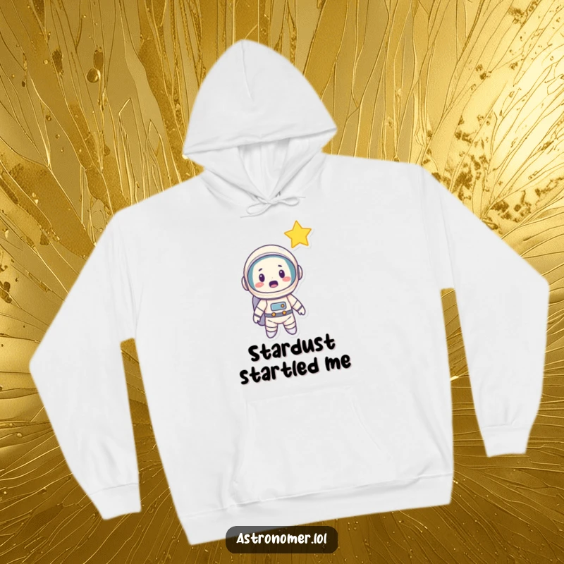 Funny Astronaut Hoodie: A cartoon astronaut making a surprised face while gazing at a brilliant shooting star across the night sky.
