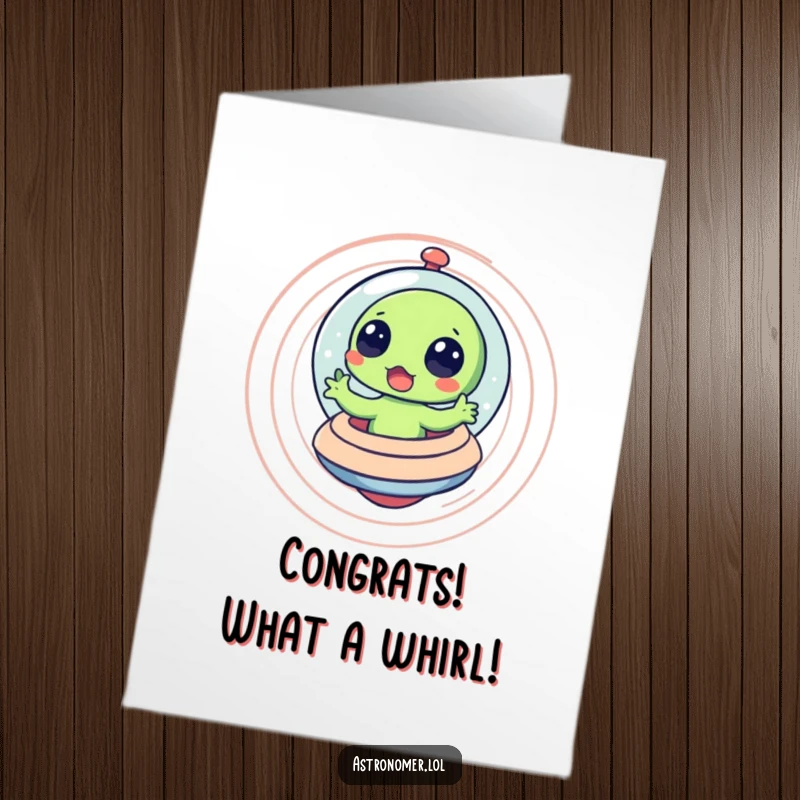 Funny Free Printable Congratulations Card: An alien inside a spaceship is spinning in dizzy circles, looking surprised.