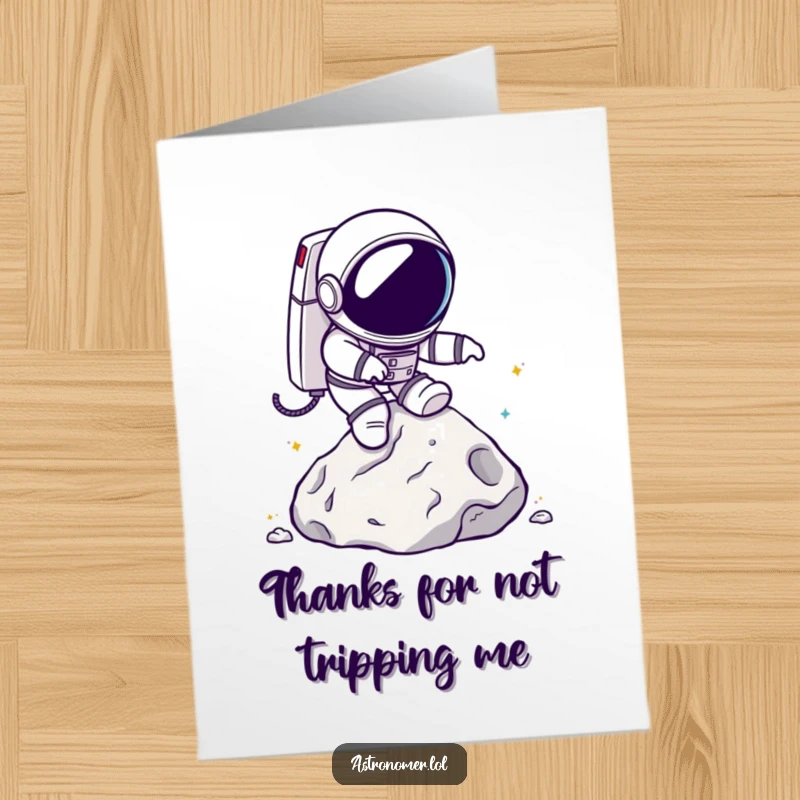 Funny Free Printable Thank You Card: Chibi astronaut stumbling over a moon rock, conveying thanks with humor.