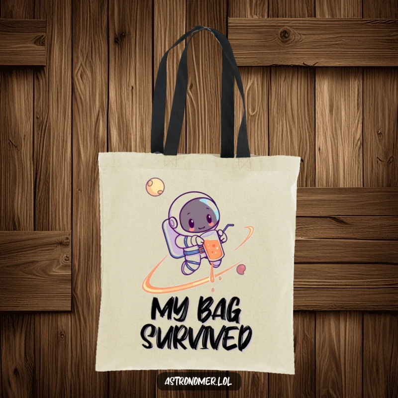 Funny Astronaut Tote Bag: A cartoon astronaut spilling a drink while orbiting a planet, perfect for carrying essentials with a laugh.
