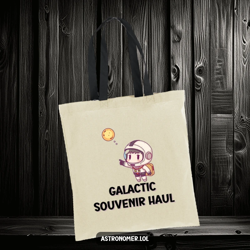 Funny astronaut tote bag with helmet playfully pointing at a galaxy, a humorous and versatile accessory for space lovers.
